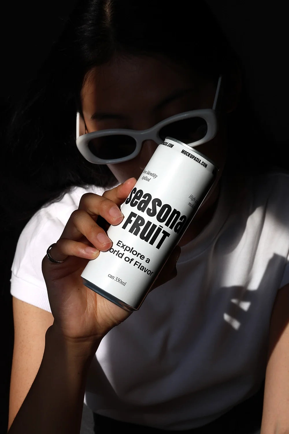 Design Studies: Slim Can & Soda Can Mockup CF03 – Held to Face, Window Light - Image 2
