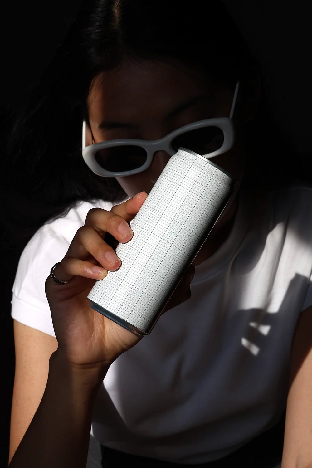 Design Studies: Slim Can & Soda Can Mockup CF03 – Held to Face, Window Light - Image 3