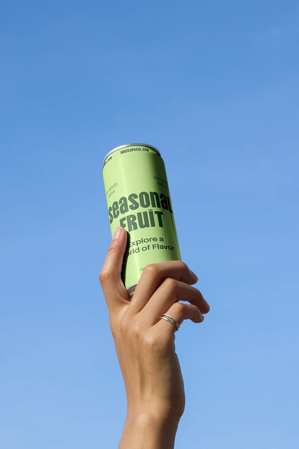 Design Studies: Slim Can Mockup CF32 – Held Upward, Blue Sky