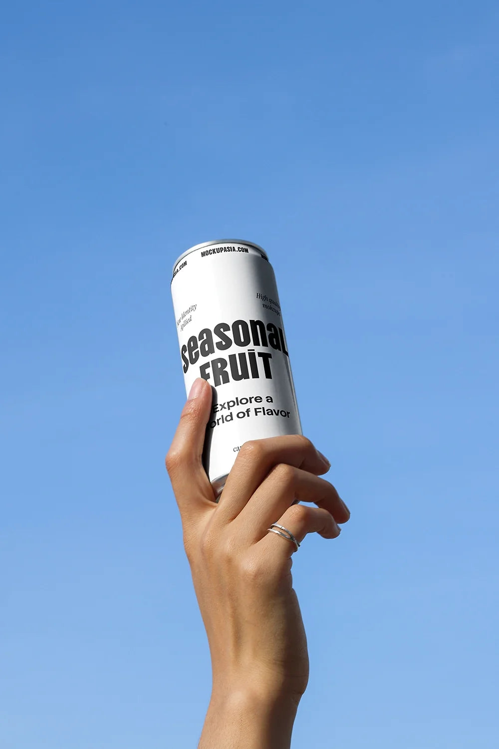 Design Studies: Slim Can Mockup CF32 – Held Upward, Blue Sky - Image 2