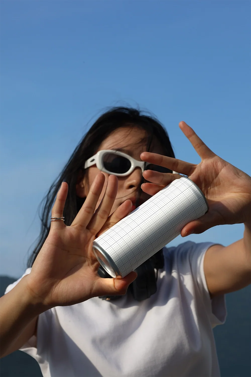 Design Studies: Slim Can Mockup CF28 – In Hand, Bright Sky - Image 3
