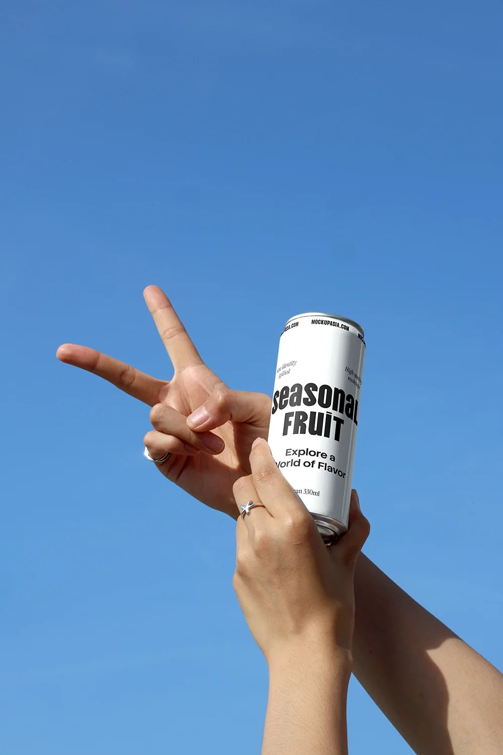 Design Studies: Slim Can Mockup CF10 – Held Against Blue Sky - Image 2